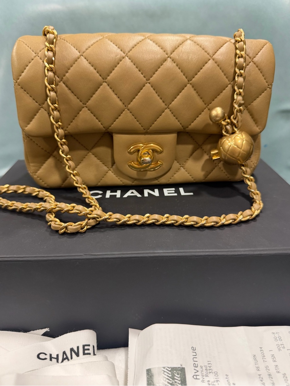 CHANEL
Lambskin Quilted Mini Rectangular Pearl Crush Flap Bag in Beige